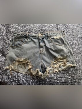 Distressed Sequin Tassel Light Wash Denim Shorts